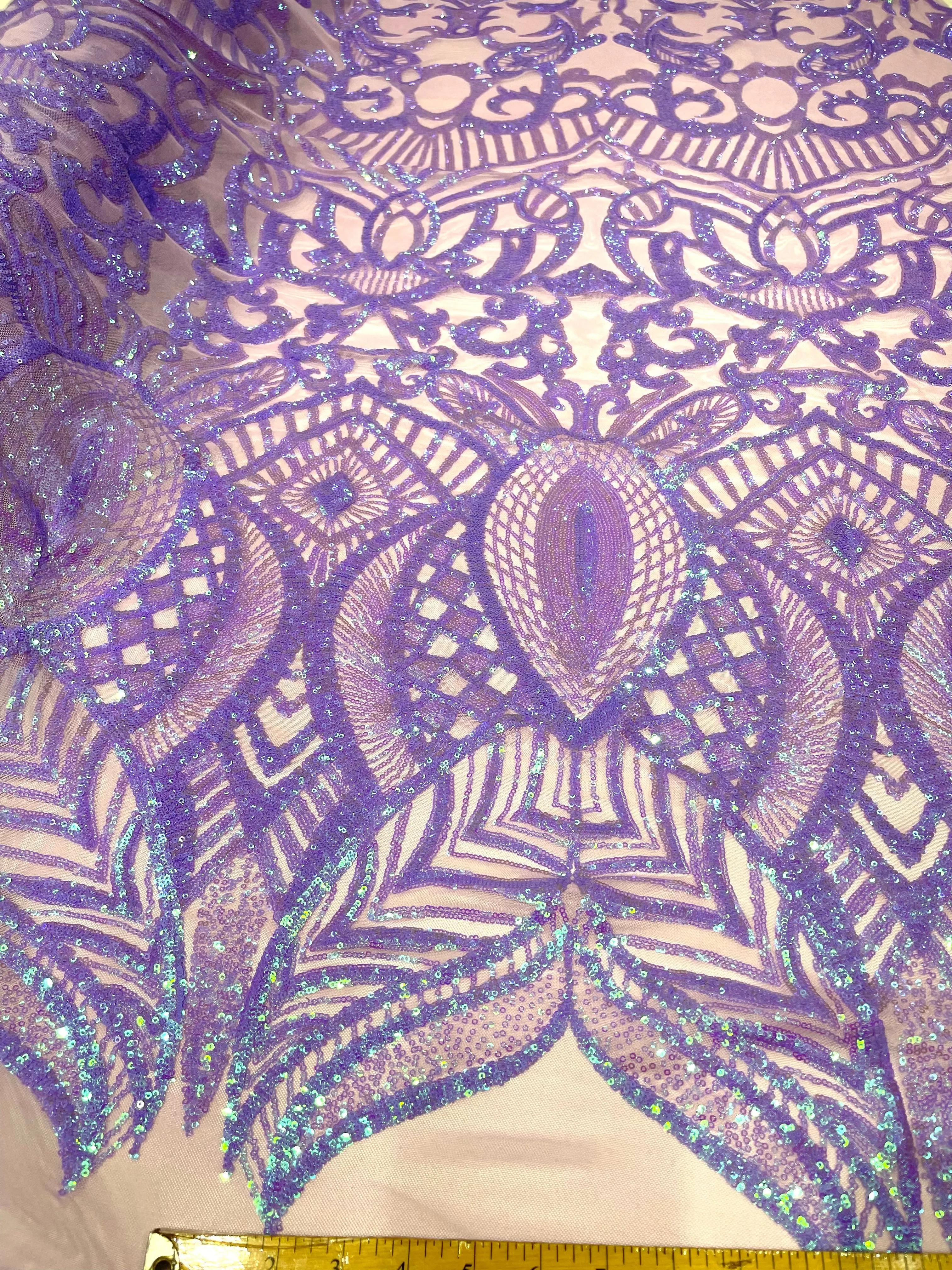 Lavender iridescent royalty design on a 4 way stretch mesh-prom-sold by the yard.