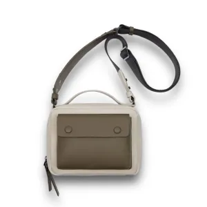 Mini luggage crossbody bag with wide shoulder straps