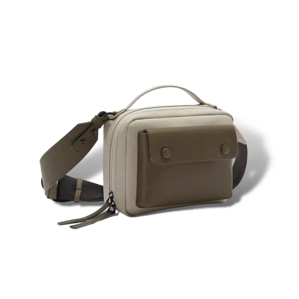 Mini luggage crossbody bag with wide shoulder straps