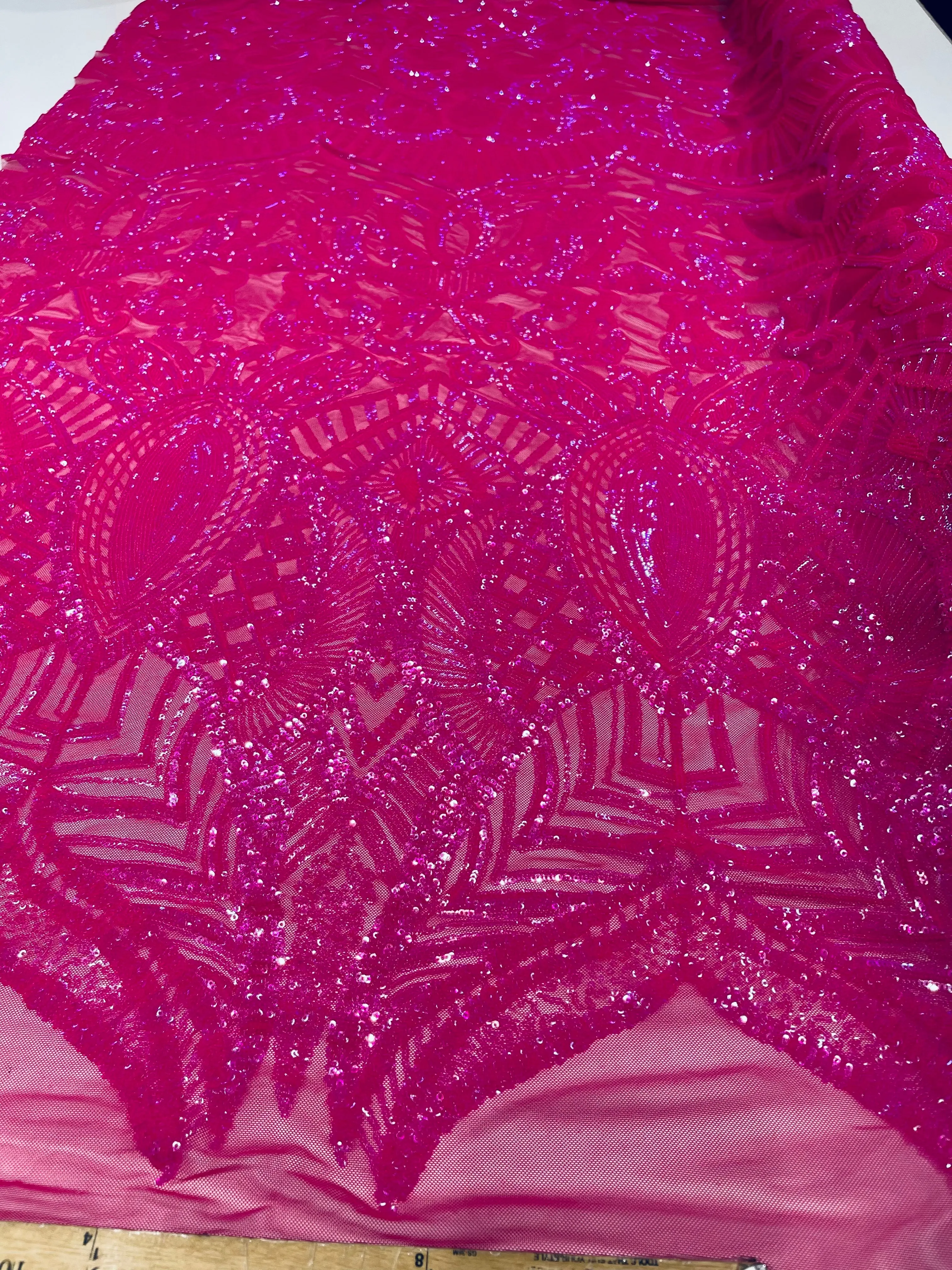 Neon pink iridescent royalty design on a 4 way stretch mesh-prom-sold by the yard.