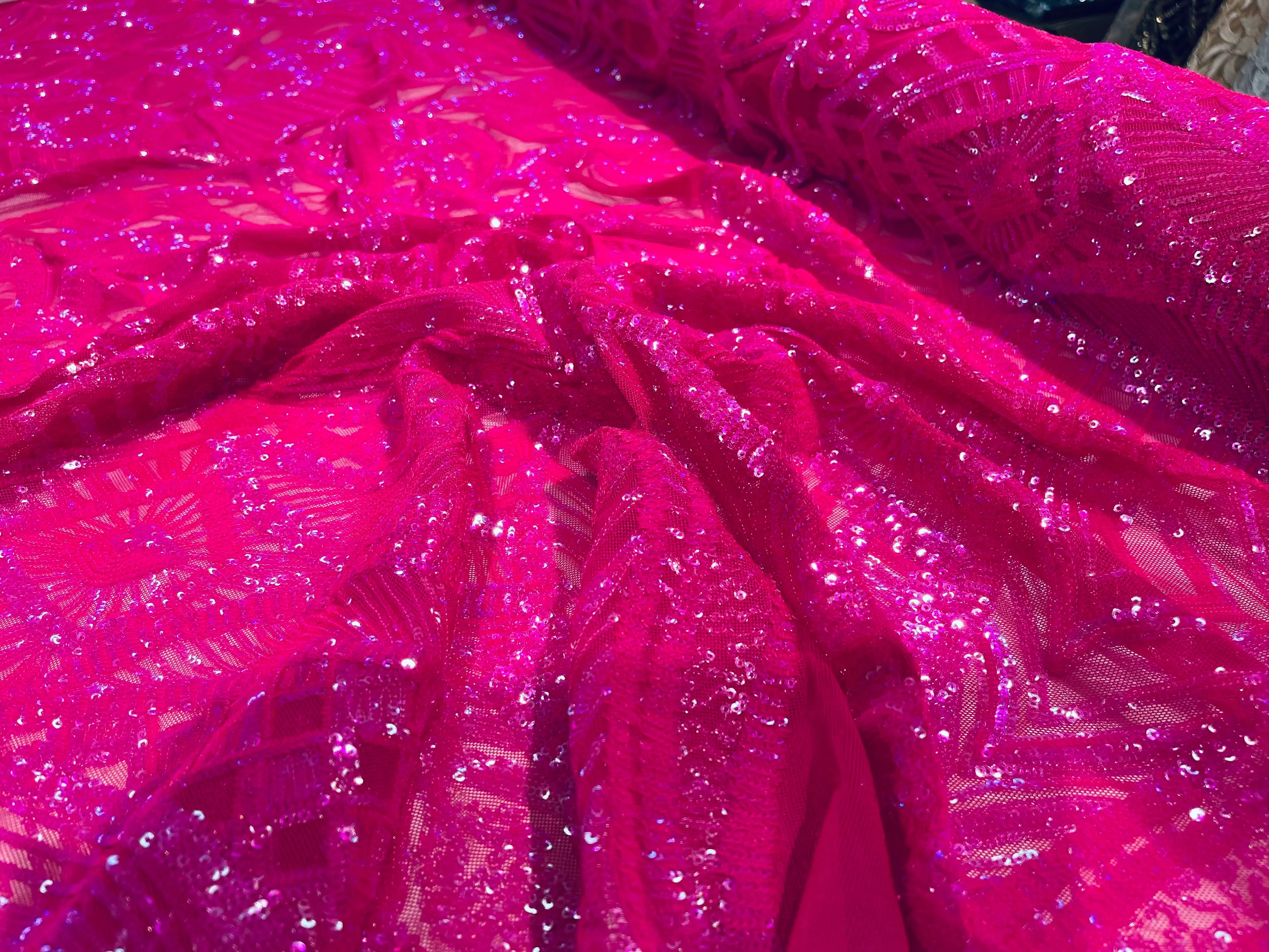 Neon pink iridescent royalty design on a 4 way stretch mesh-prom-sold by the yard.