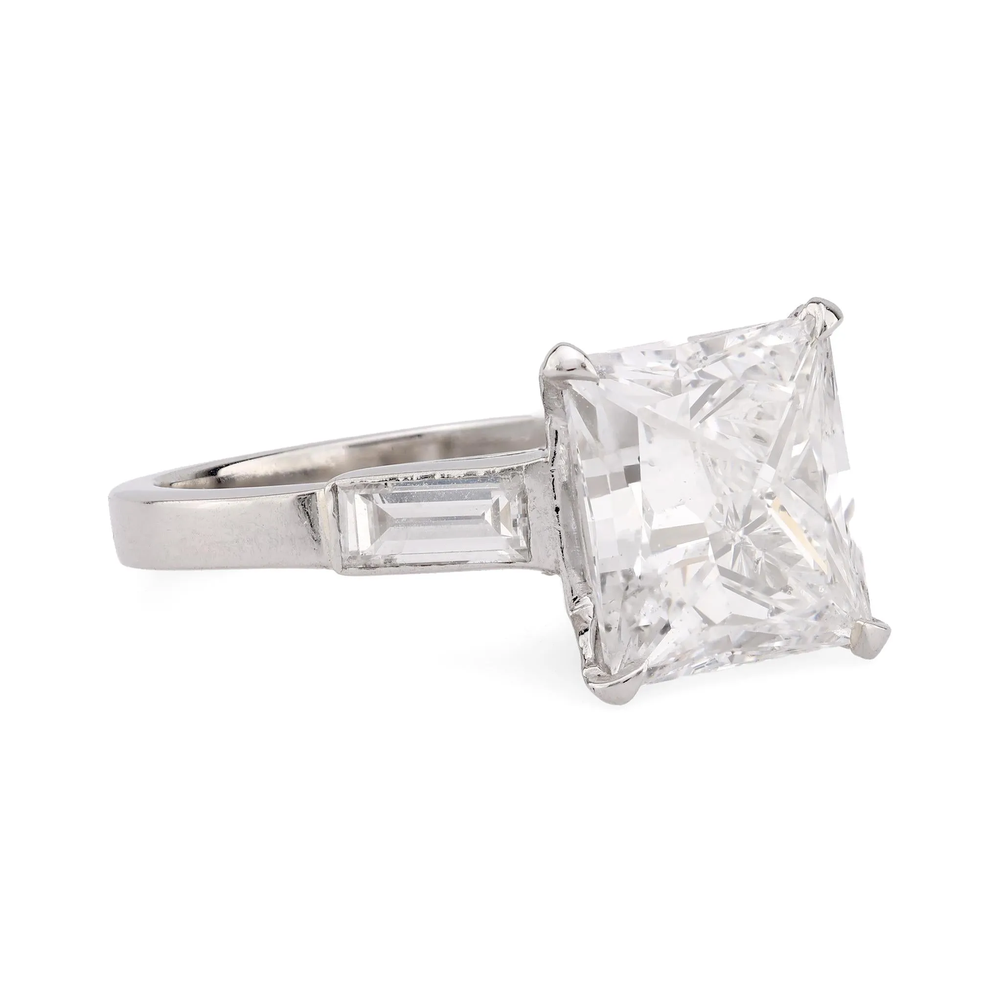 Striking GIA 3.02 carat rectangular cut diamond platinum engagement ring