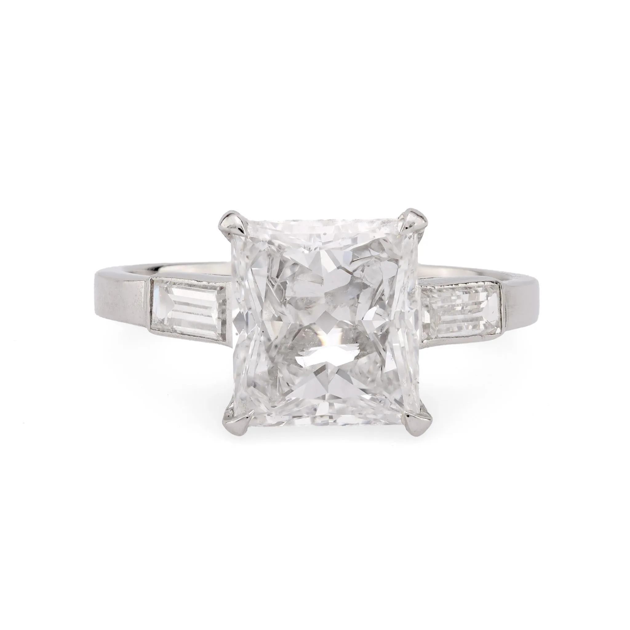 Striking GIA 3.02 carat rectangular cut diamond platinum engagement ring