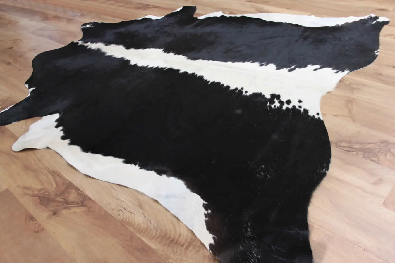 Striking Monochrome Luxury Black and White Cowhide Rug